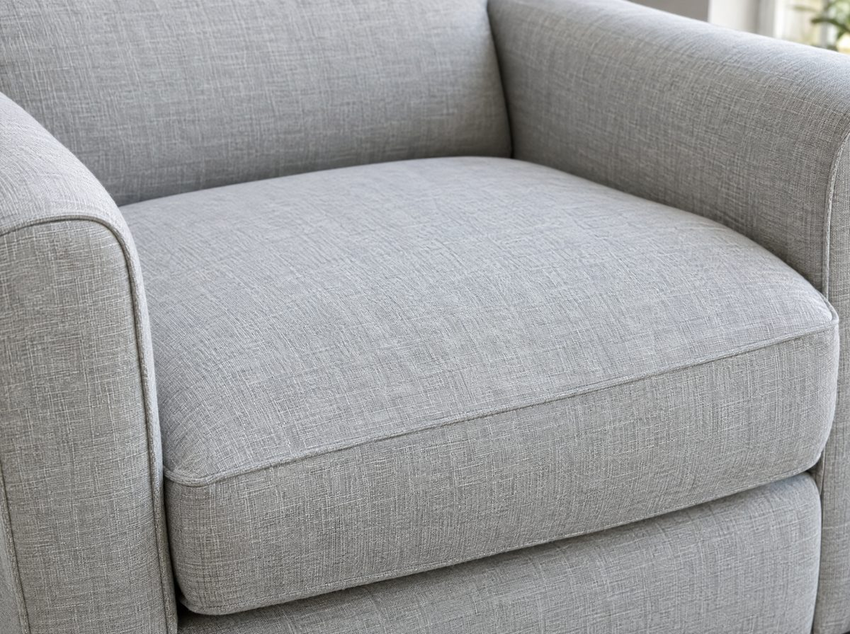 Clean light grey linen armchair after upholstery extraction